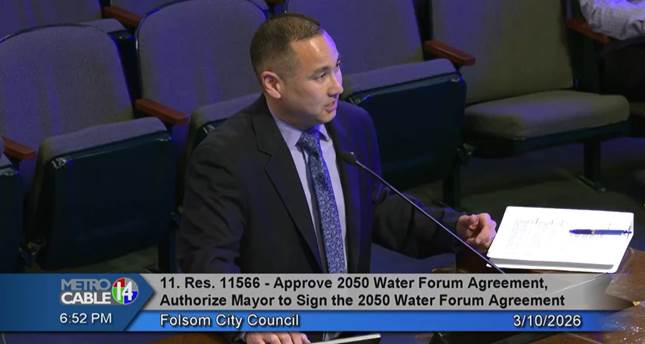 A person sitting at a desk
AI-generated content may be incorrect.