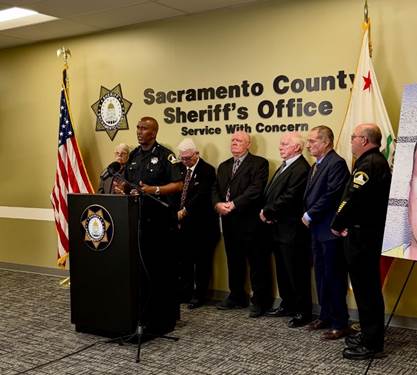 A group of men in military uniforms standing at a podium

AI-generated content may be incorrect.